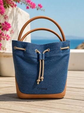 O bag Denim & Faux Leather Bucket Bag
15 x13 in size NWT